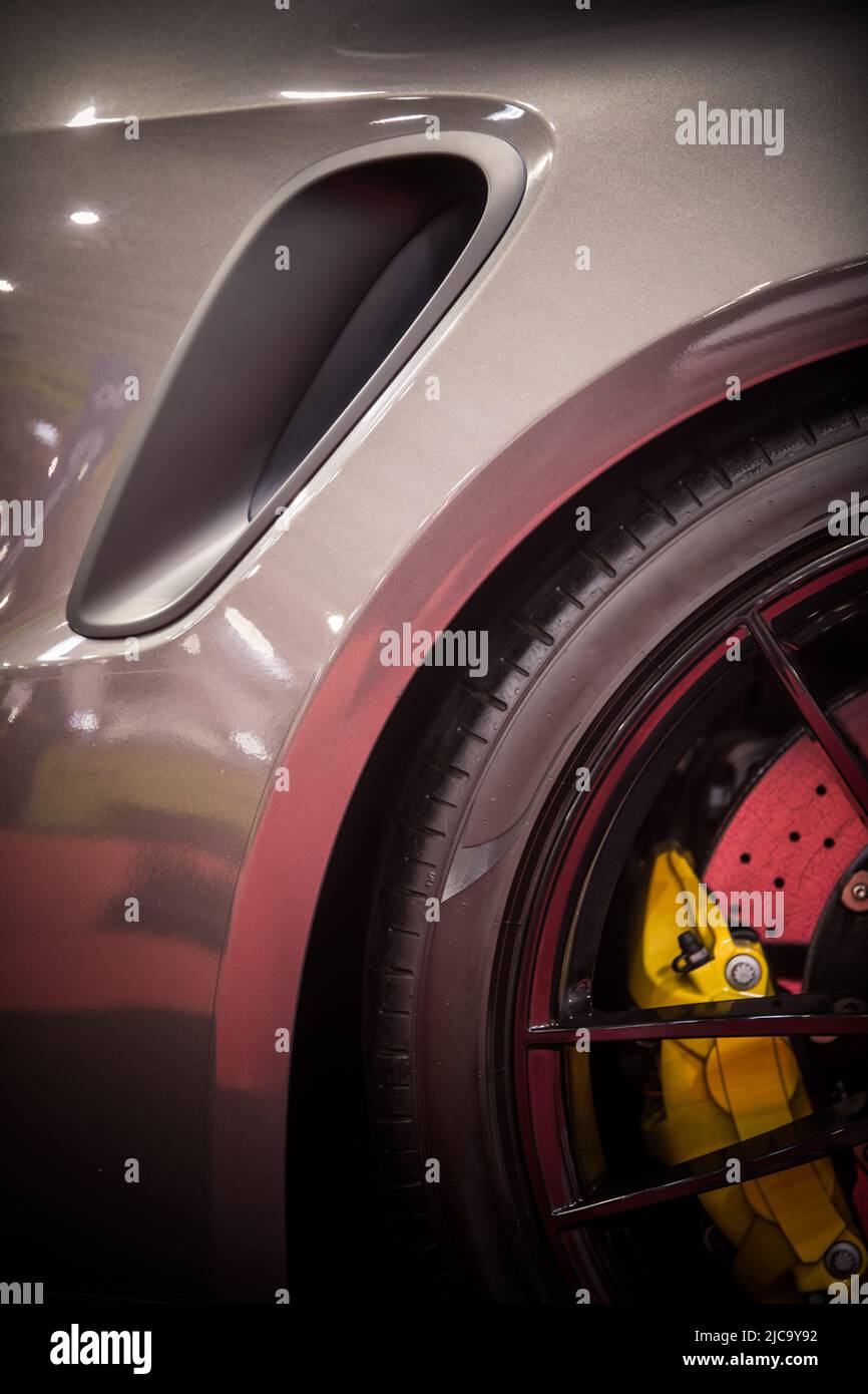 Modern car tire, brake caliper and brake disk Stock Photo Alamy