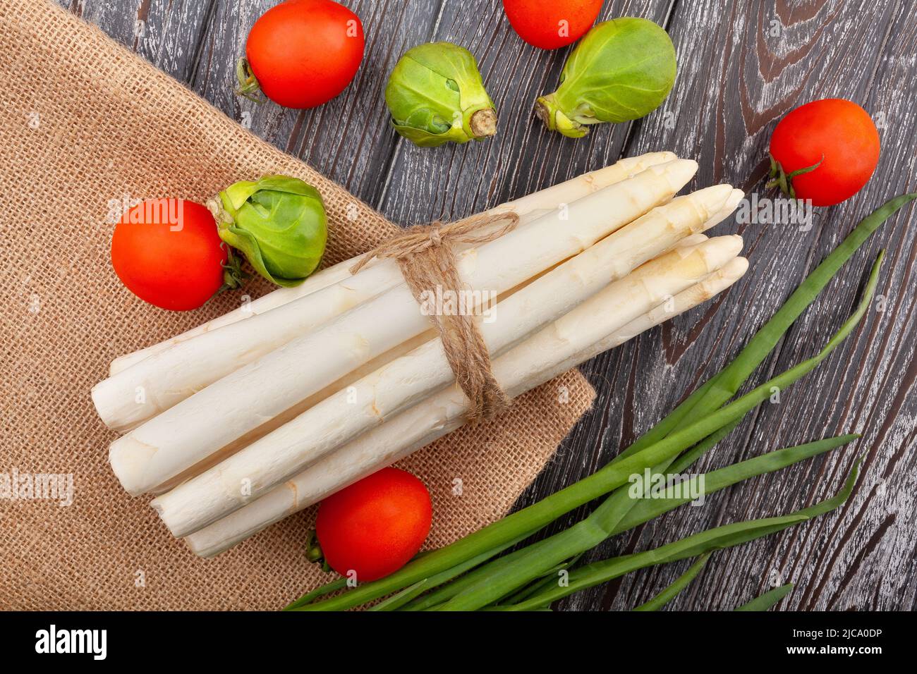 white asparagus on wood background top view Stock Photo