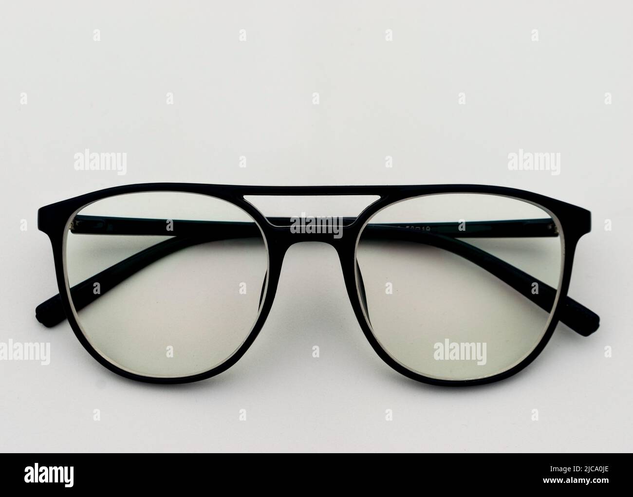 black frame anti-scratching technology anti glare spectacles glasses made of acetate material on white background Stock Photo