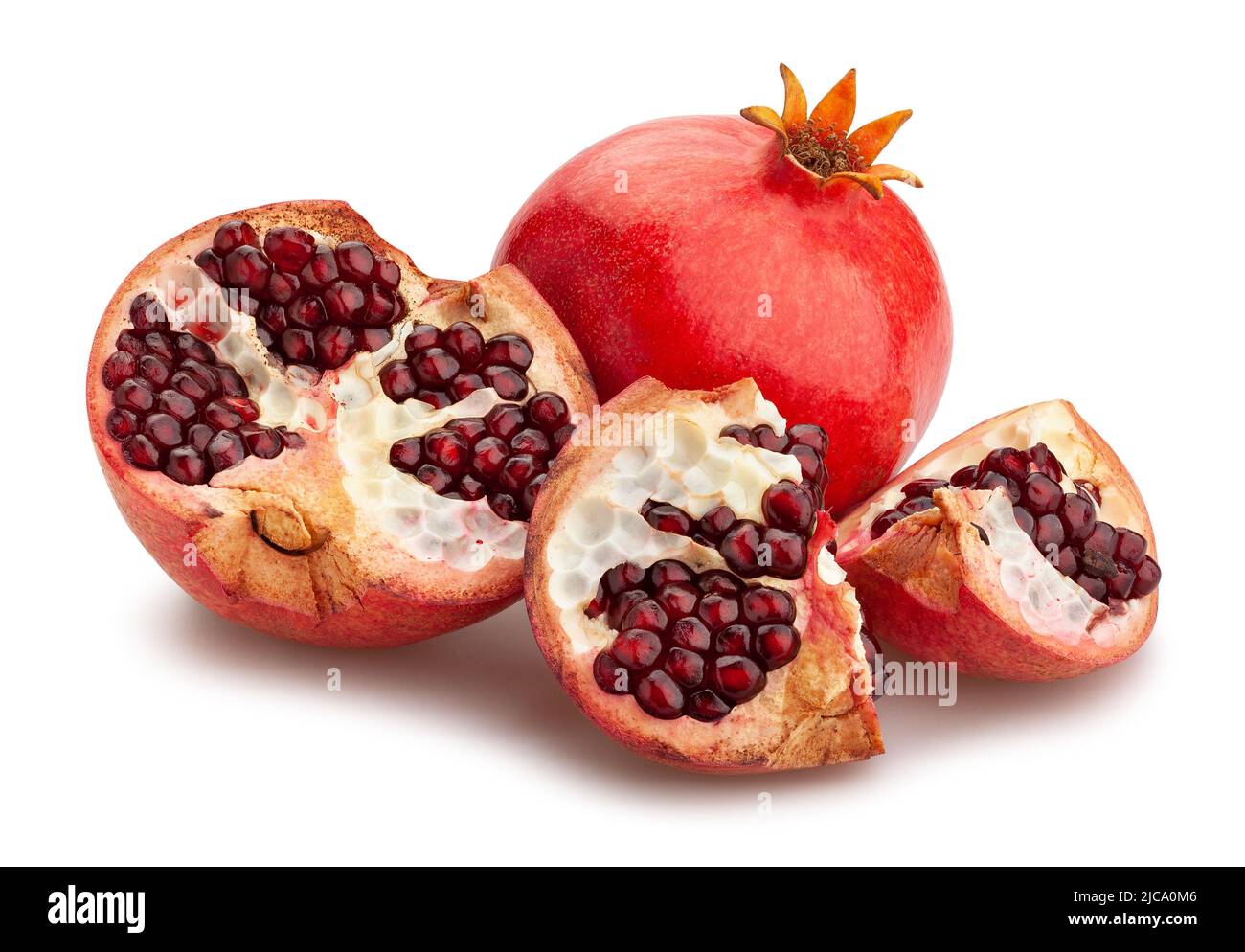 sliced pomegranate path isolated on white Stock Photo