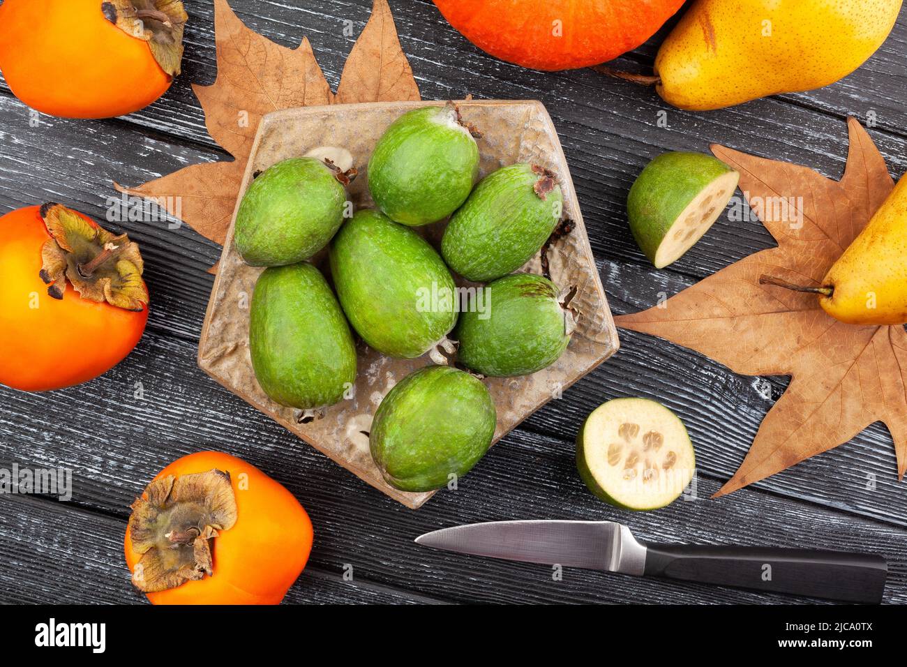 feijoa group on wood background top view Stock Photo