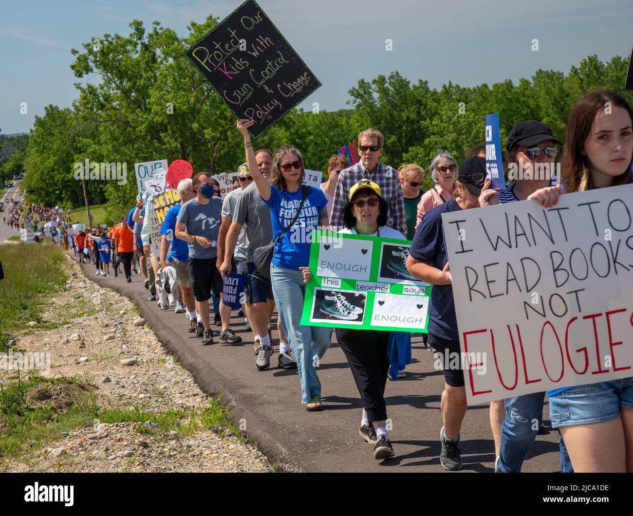 Oxford, Michigan, USA. 11th June, 2022. Hundreds rallied for tighter gun control laws in the town where four students were shot and killed at Oxford High School in November 2021. It was one of many rallies organized by March for Our Lives across the country protesting gun violence and mass shootings. The Oxford rally was organized by the student group No Future Without Today. Credit: Jim West/Alamy Live News Stock Photo
