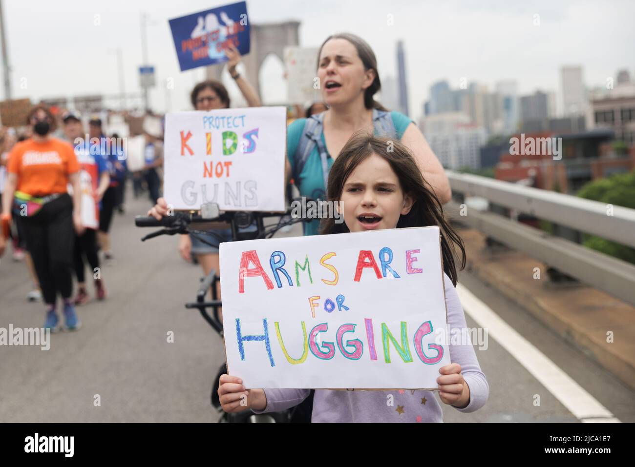 Helen Carpenter, 8 1/2 years old, attends 'March for Our Lives' rally, one of a series of nationwide protests against gun violence, in Manhattan, New York City, U.S., June 11, 2022. REUTERS/Jeenah Moon Stock Photo