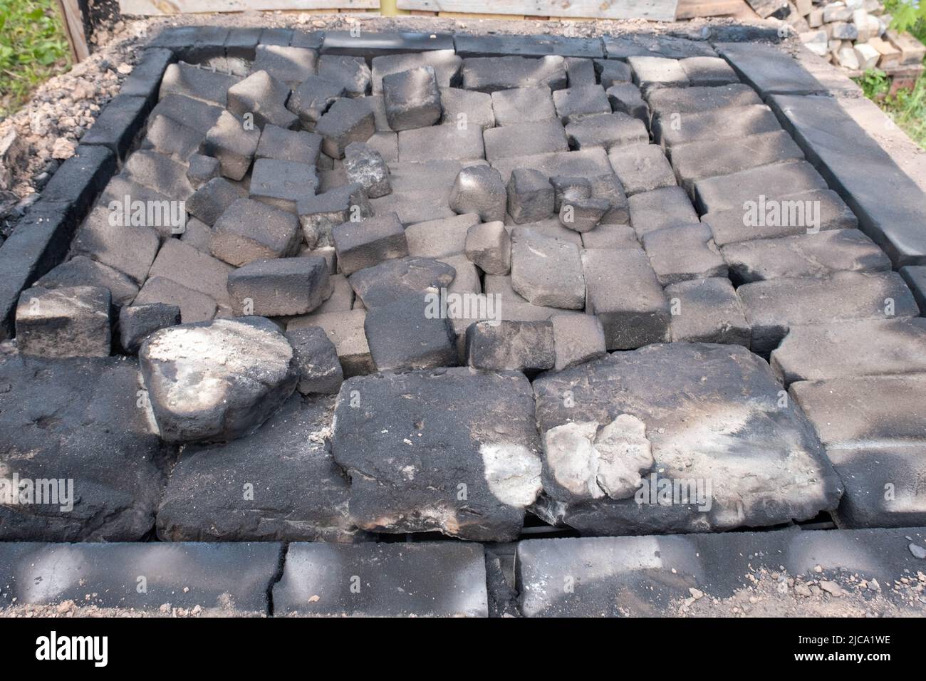 opening of a ceramic kiln, Unique handmade pots and dishes of clay