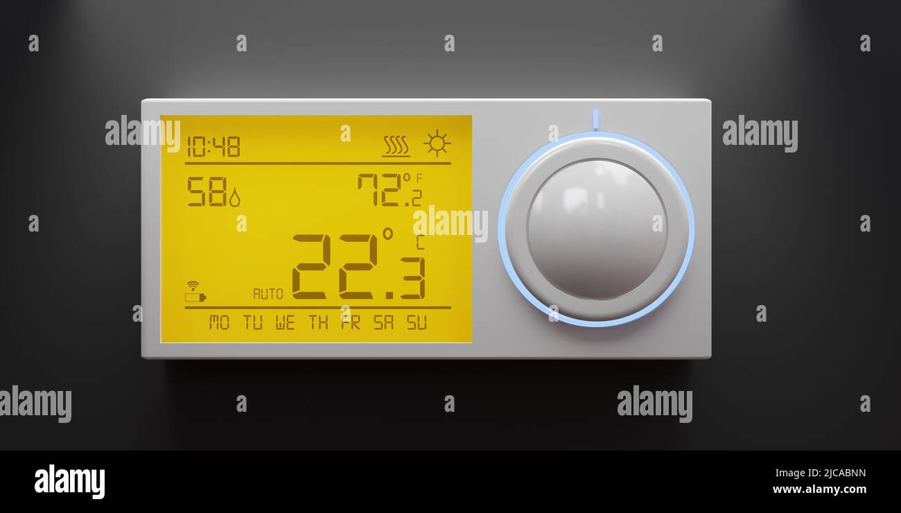 Digital thermostat on dark wall, Home heating temperature control