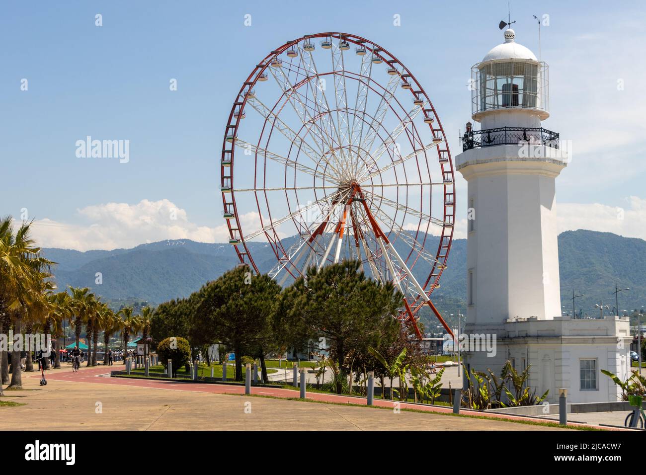 Batumi, Georgia-May 15 2022: General view of Batumi city center and sea shore on a sunny summer day.Tourist destination. Batumi Ferris Wheel,lighthous Stock Photo