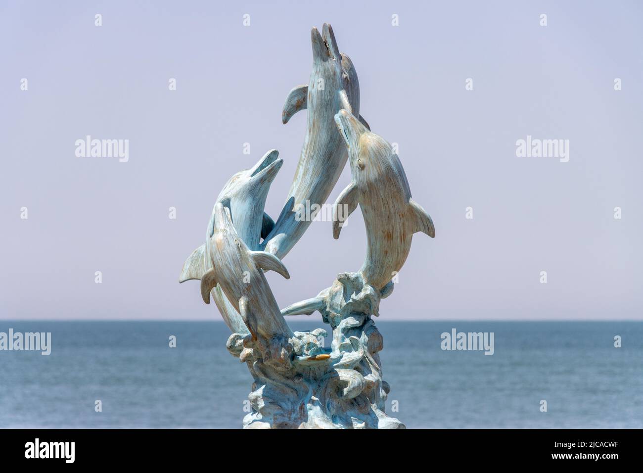 Batumi, Georgia - May 15 2022: Dolphin statue on the coast of Batumi Stock Photo
