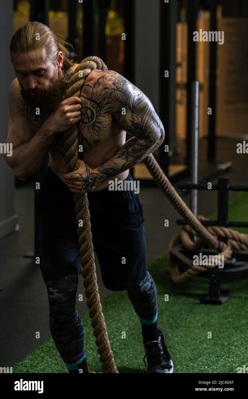 Rope invisible man tug pull was casual force person competition ...