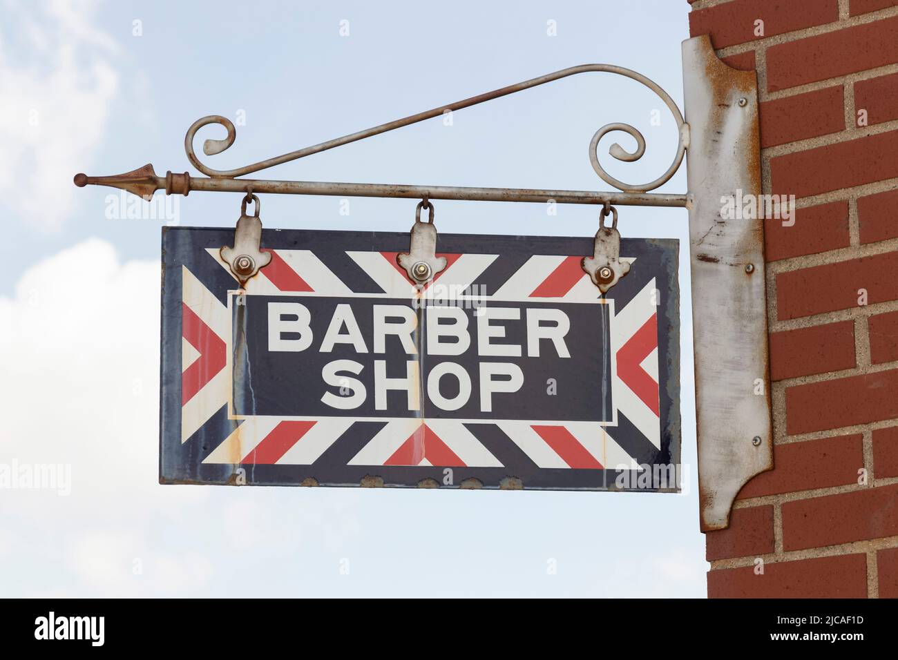 Barber Shop sign. Old-fashioned red and blue striped Barber Shop sign. Stock Photo