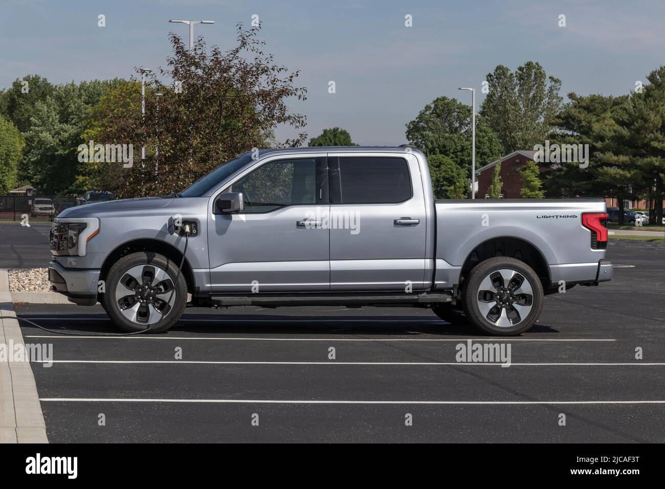 Kokomo - Circa June 2022: Ford F-150 Lightning display. Ford offers the F150 Lightning all-electric truck in Pro, XLT, Lariat, and Platinum models. Stock Photo