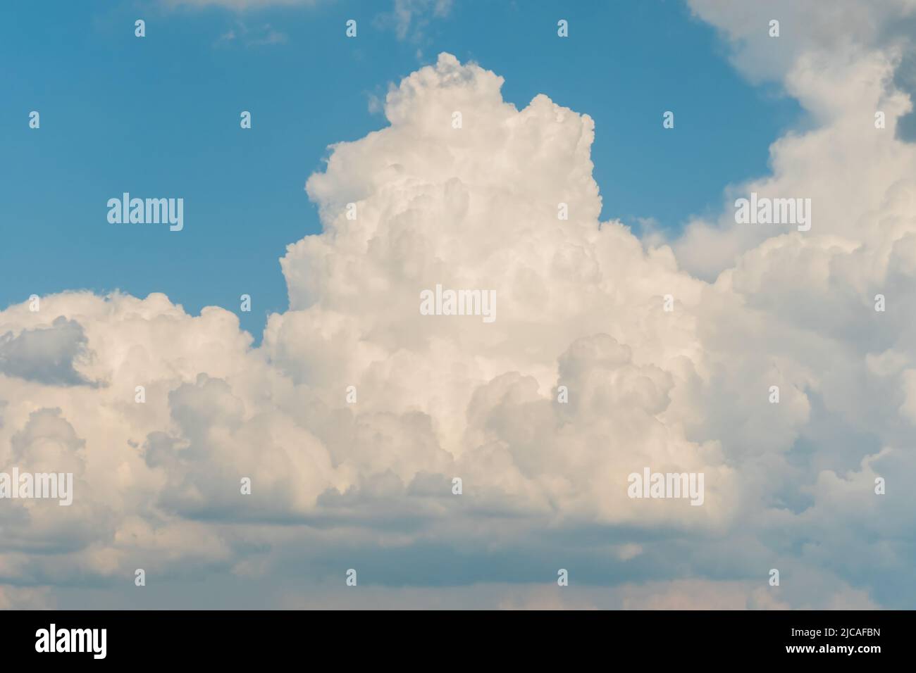 White clouds against blue sky Stock Photo - Alamy