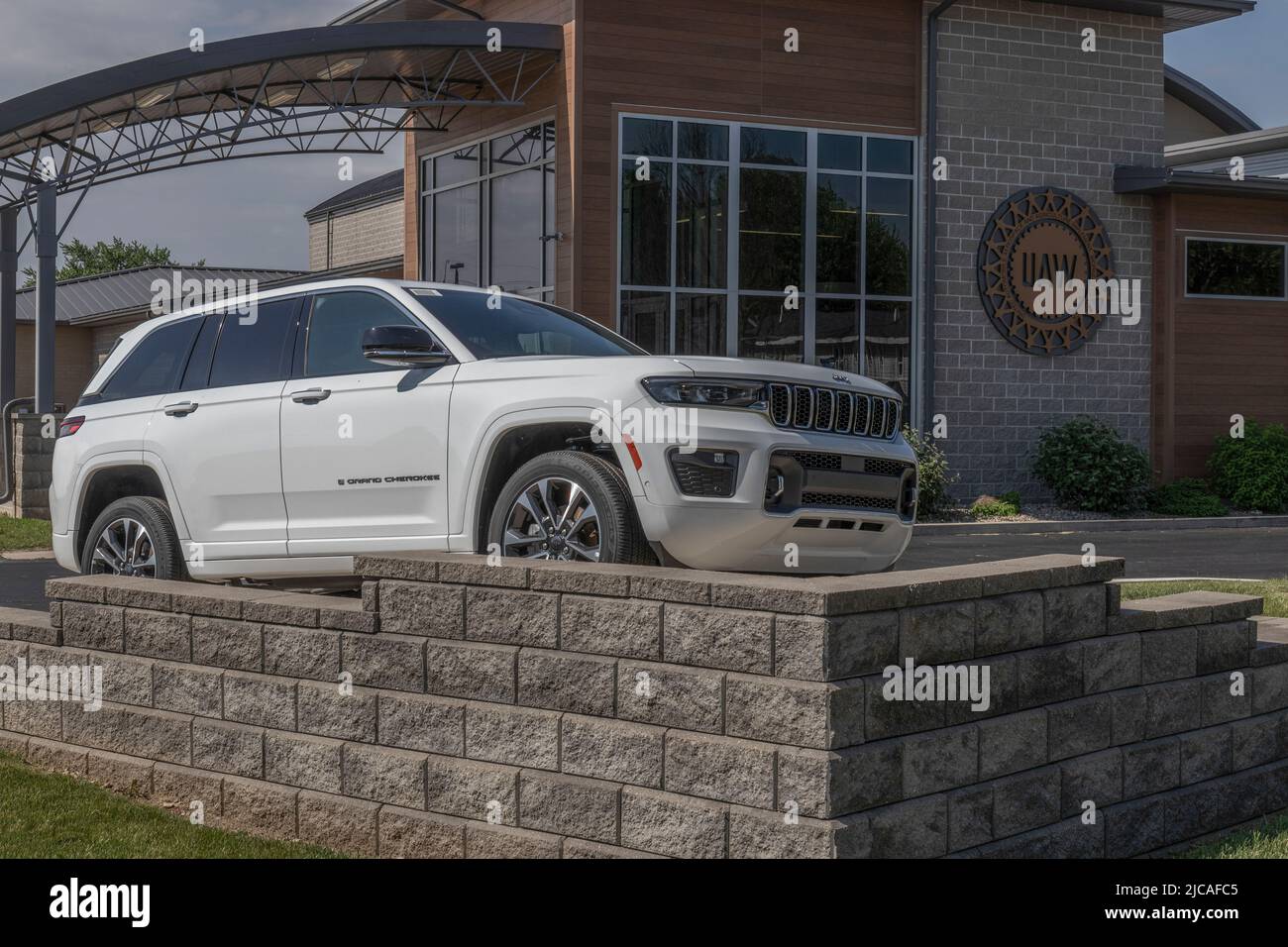 Kokomo - Circa June 2022: Jeep Grand Cherokee display at a UAW Local. The UAW represents workers from Jeep, Chrysler, Dodge and Stellantis factories. Stock Photo