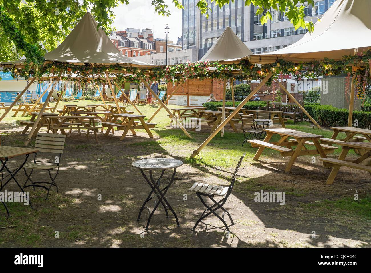 Cavendish Square with tables and chairs set up outside in the summer