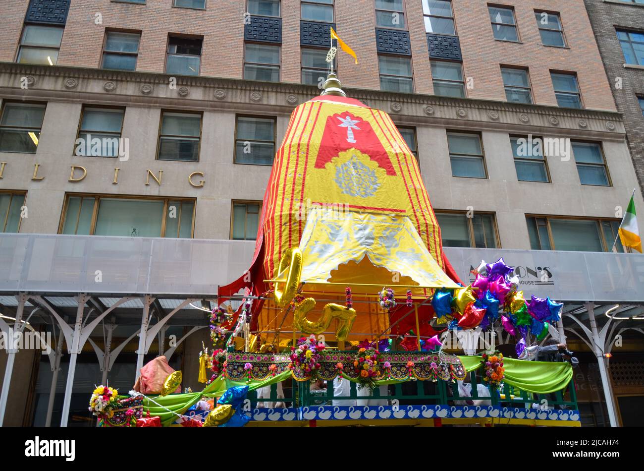 Hare Krishna followers gathered at Fifth Avenue, New York City during the Hare Krishna Parade on June 11, 2022. Stock Photo