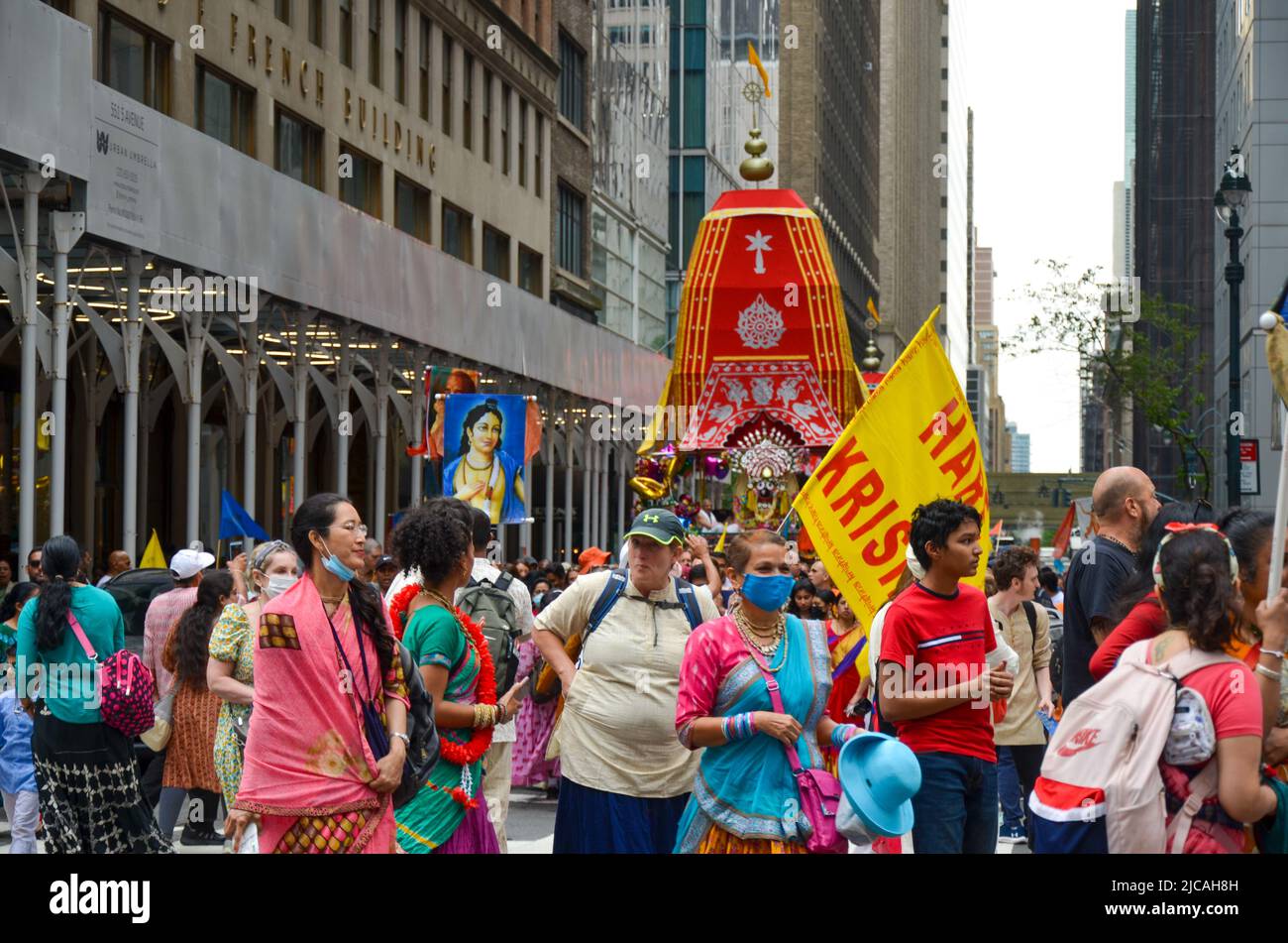 Hare Krishna followers wait for the start of the Hare Krishna Ratha Yatra parade June 11, 2022 in New York City. Stock Photo