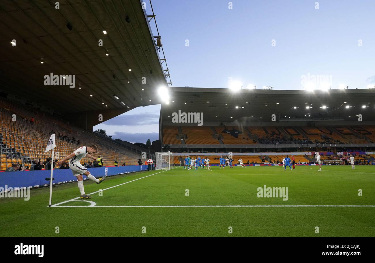 England's James WardProwse takes a corner kick, in front of empty