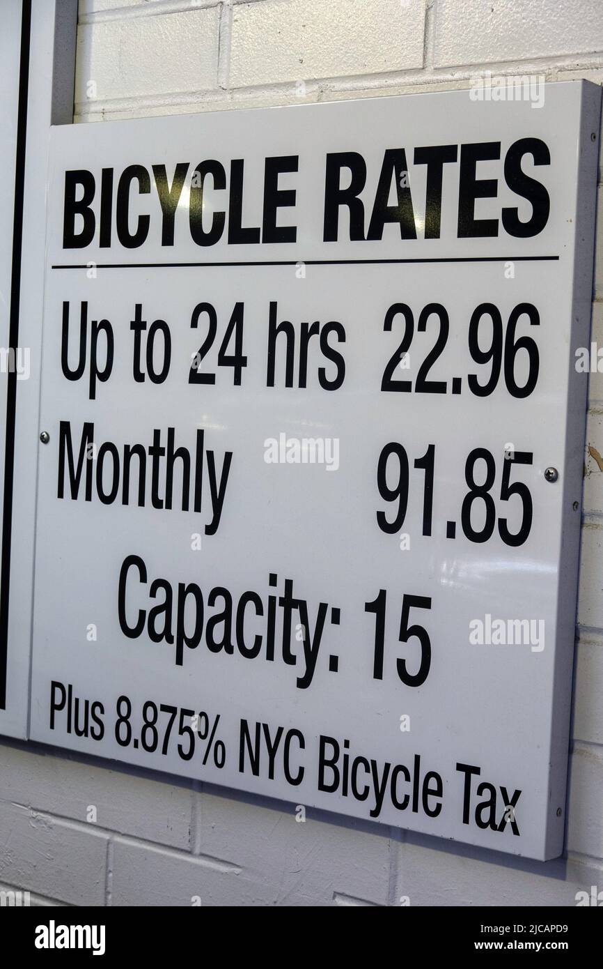 Parking Garage Bicycle Rates Sign in New York City, USA 2022 Stock
