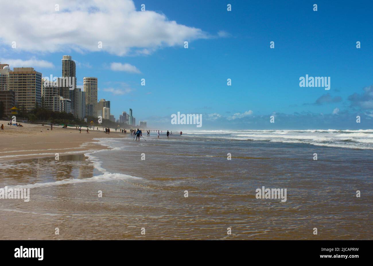 Surfers Paradise or the Gold Coast, Queensland Australia, People on the beach and in the ocean by the city Stock Photo