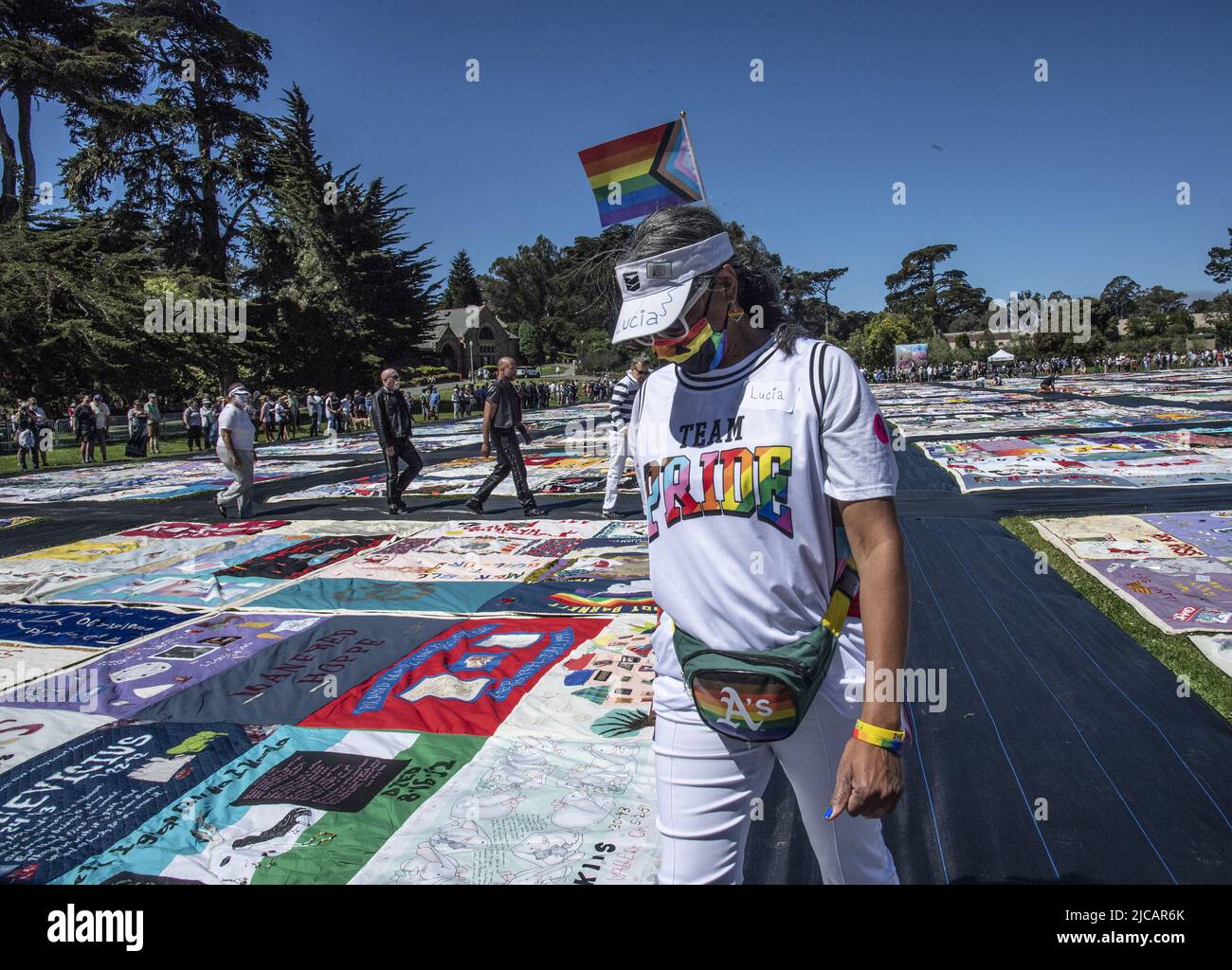 San Francisco, United States. 11th June, 2022. Volunteers help lay out the AIDS Memorial Quilt on its 35th anniversary in Robin Williams meadow in Golden Gate Park on Saturday, June 11, 2022 in San Francisco. 3,000 panels of the quilt were displayed, each dedicated to a person who died of AIDS. Photo by Terry Schmitt/UPI Credit: UPI/Alamy Live News Stock Photo