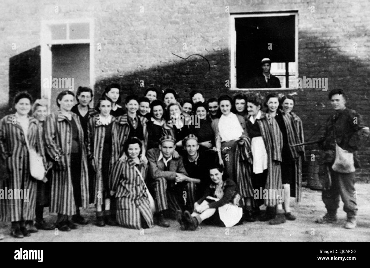 Jewish prisoners of Gęsiowka, a German-Nazi Camp in Warsaw liberated in August 5, 1944 by Polish soldiers from Battalion 'Zośka' of Home Army in the beginning of Warsaw Uprising. Many of these released prisoners joined the Home Army. The Warsaw Uprising was a massive attempt by the Polish Home Army to defeat the Wehrmacht and SS Occupation towards the end of WW2. Stock Photo