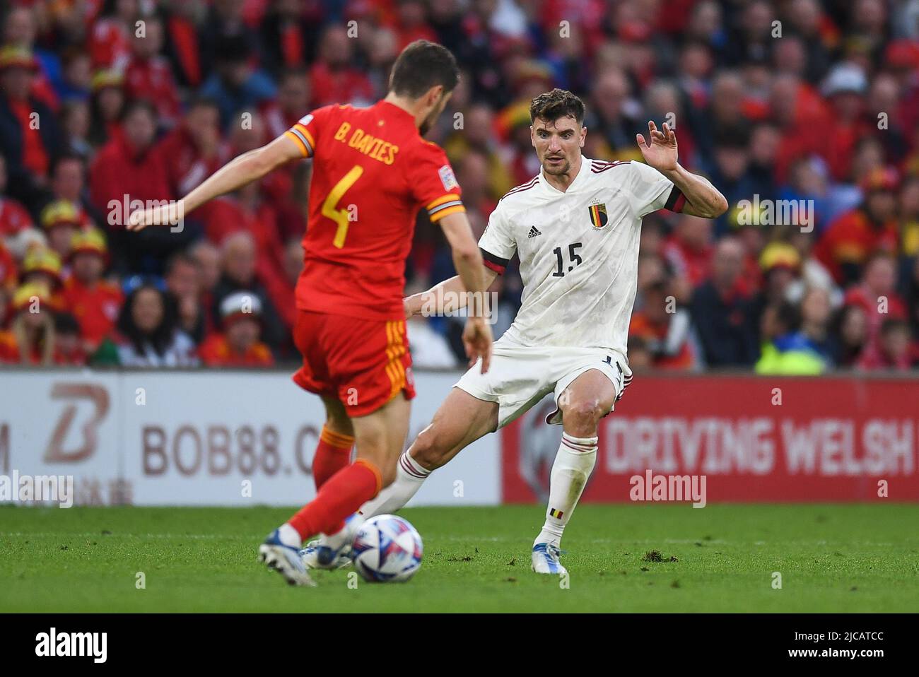 Cardiff, UK. 11th June, 2022. Ben Davies of Wales, tackled by Thomas Meunier of Belgium, in Cardiff, United Kingdom on 6/11/2022. (Photo by Mike Jones/News Images/Sipa USA) Credit: Sipa USA/Alamy Live News Stock Photo