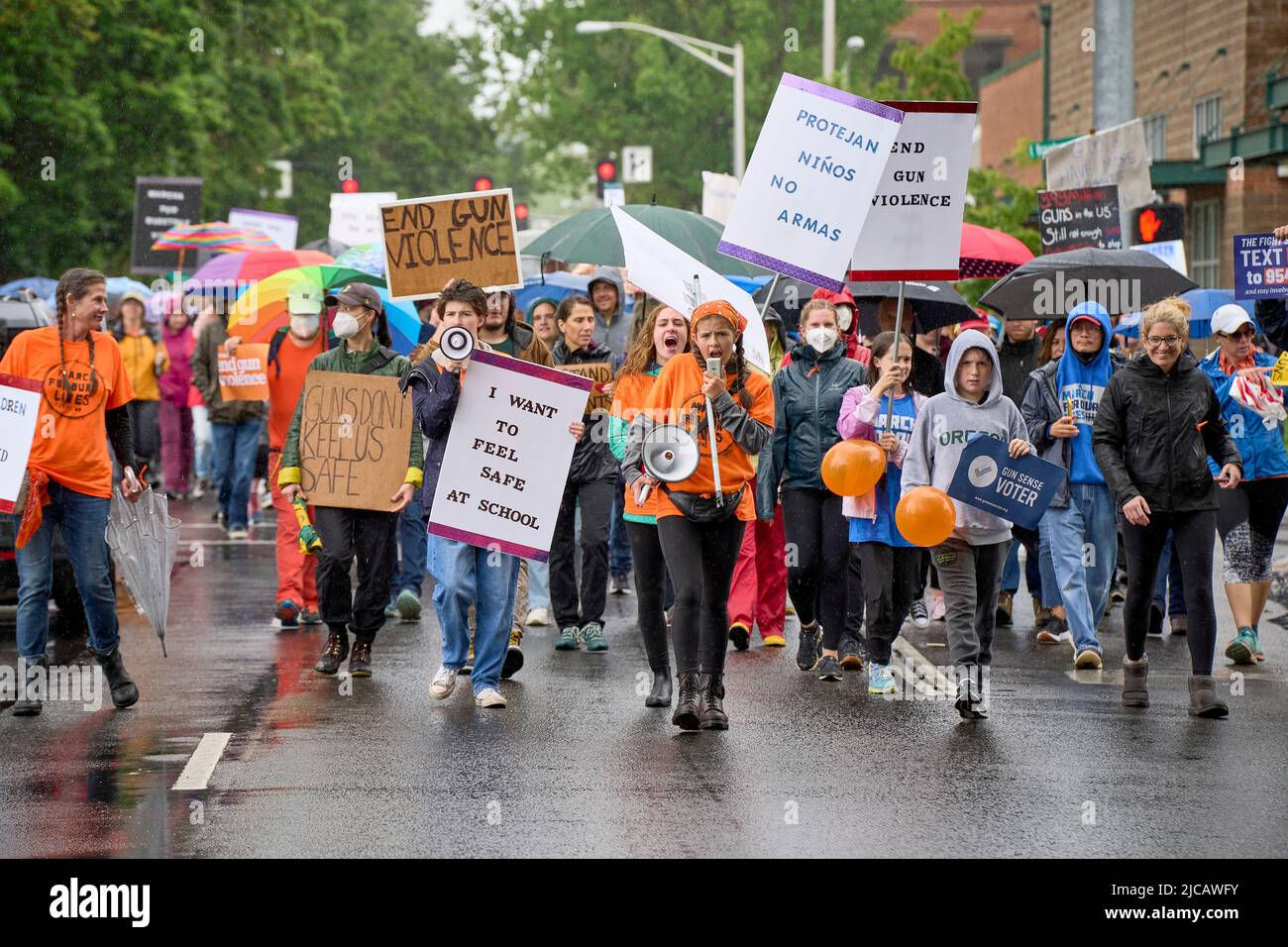 Participants in a June 11, 2022, March for our Lives in Eugene, Oregon, USA. The marchers, angered by a spate of recent mass shootings, demanded stric Stock Photo