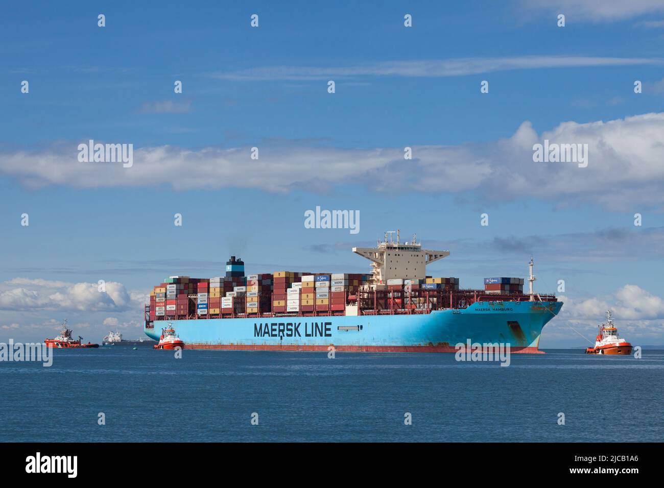 Picture of a sign with the logo of Maersk on a container being shipped by sea on a container ship in Koper Slovenia. Maersk, is a Danish integrated sh Stock Photo
