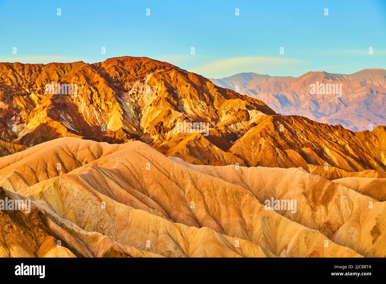Stunning sunrise colors in Zabriskie Point park desert mountains Stock Photo Alamy