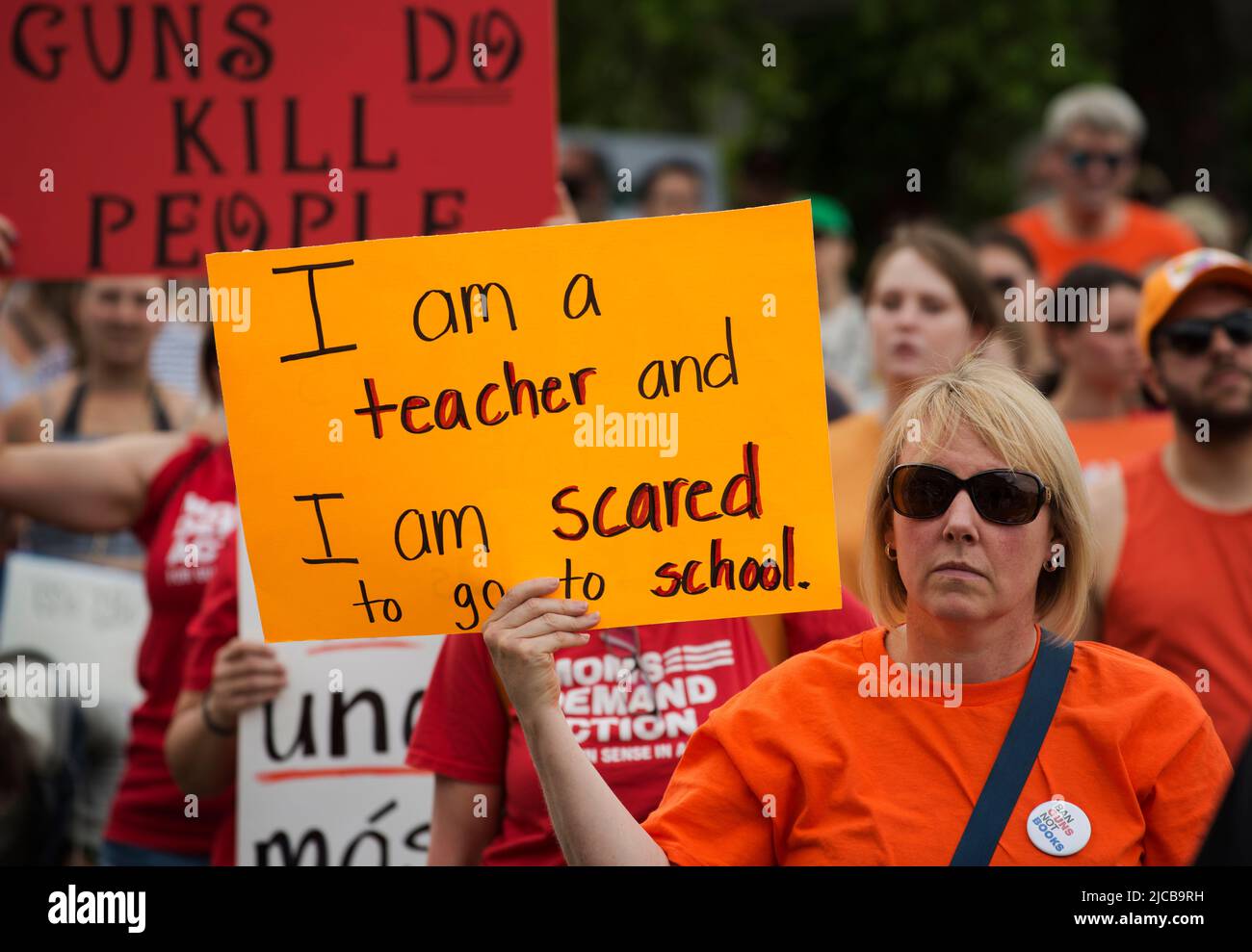 March for Our Lives 2022, Boston, MA, USA:  Thousands gathered on the Boston waterfront as over 450 demonstrations against gun violence took place across the U.S.  Photo shows a public-school teacher holding sign about feeling safe in school.  Credit: Chuck Nacke / Alamy Live News Stock Photo