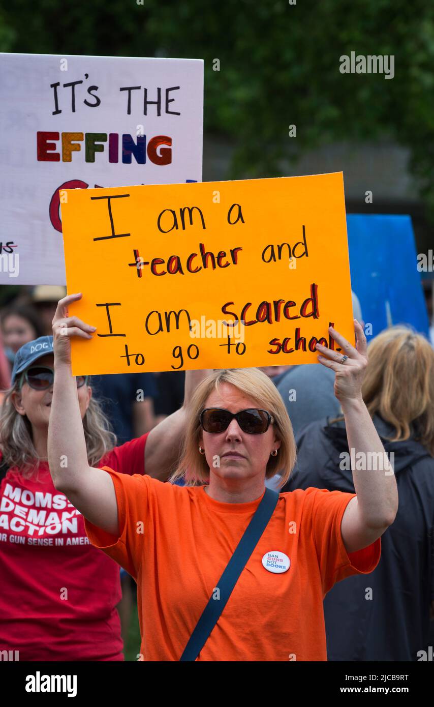 March for Our Lives 2022, Boston, MA, USA:  Thousands gathered on the Boston waterfront as over 450 demonstrations against gun violence took place across the U.S.  Photo shows a public-school teacher holding sign about feeling safe in school.  Credit: Chuck Nacke / Alamy Live News Stock Photo
