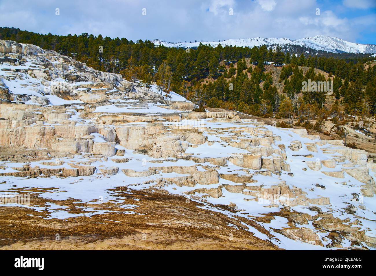 Snow-covered terraces in winter at Yellowstone Hot Springs Stock Photo ...
