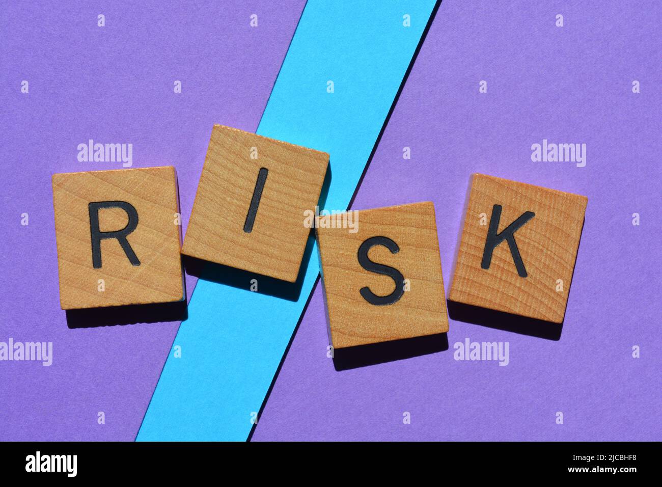 Risk, word in wooden alphabet letters isolated on background Stock ...