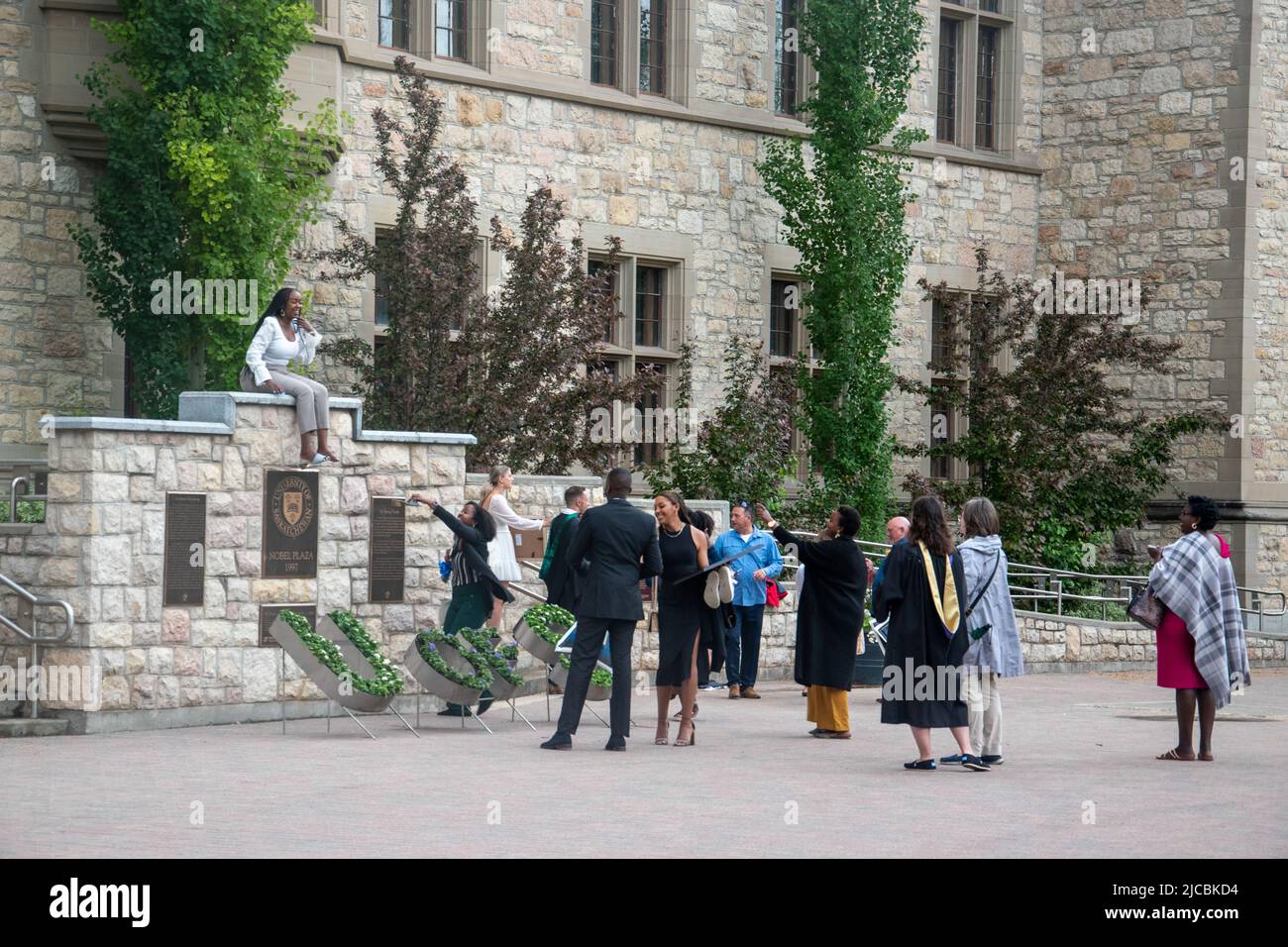 Families taking photos during convocation outside of Convocation Hall, University of Saskatchewan, Main Campus, Saskatoon, Saskatchewan. Stock Photo