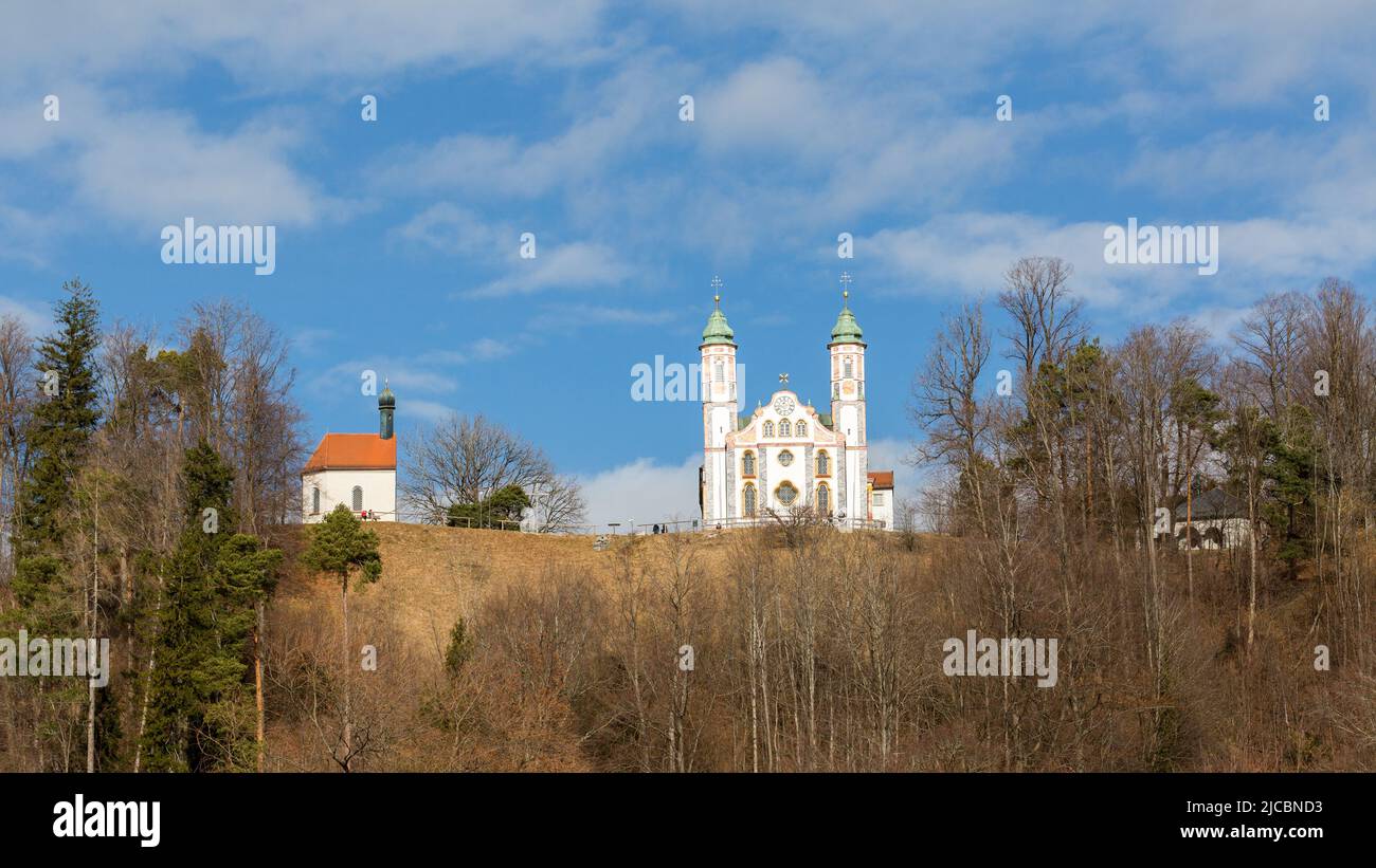 Bad Tölz, Germany - Feb 2, 2022: Panorama of the Kalvarienberg with Kalvarienbergkirche (right) and Leonhardkapelle (left). Landmarks of Bad Tölz. Stock Photo
