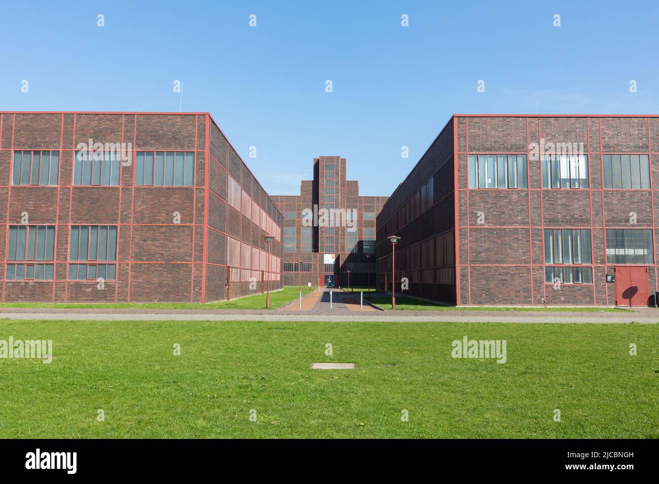 Essen, Germany - Mar 26, 2022: Brick buildings at Zeche Zollverein. The whole area is an UNESCO world heritage site. Stock Photo