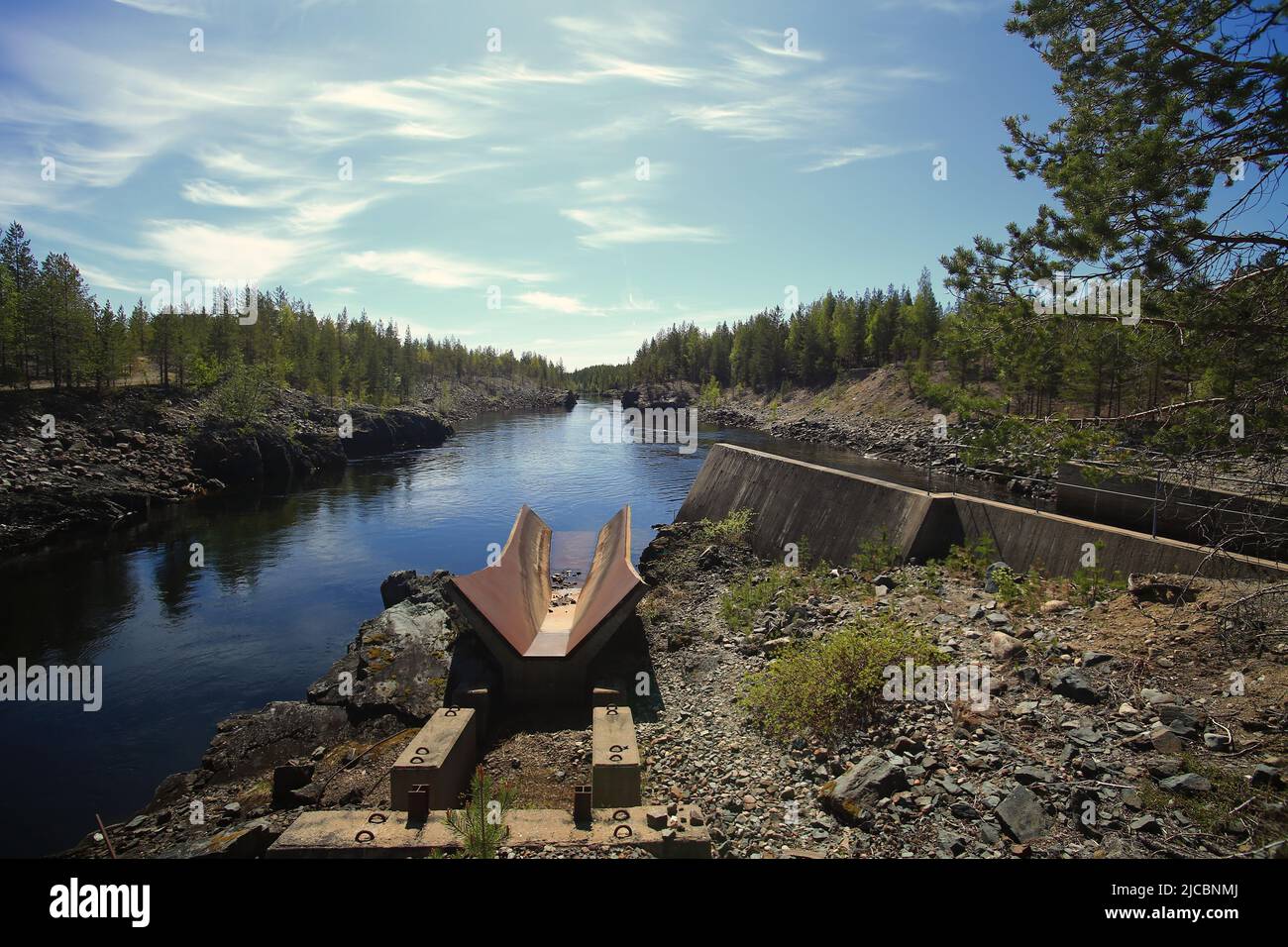 Steel ramp at a northern Swedish river, once used for stream regulation. Stock Photo