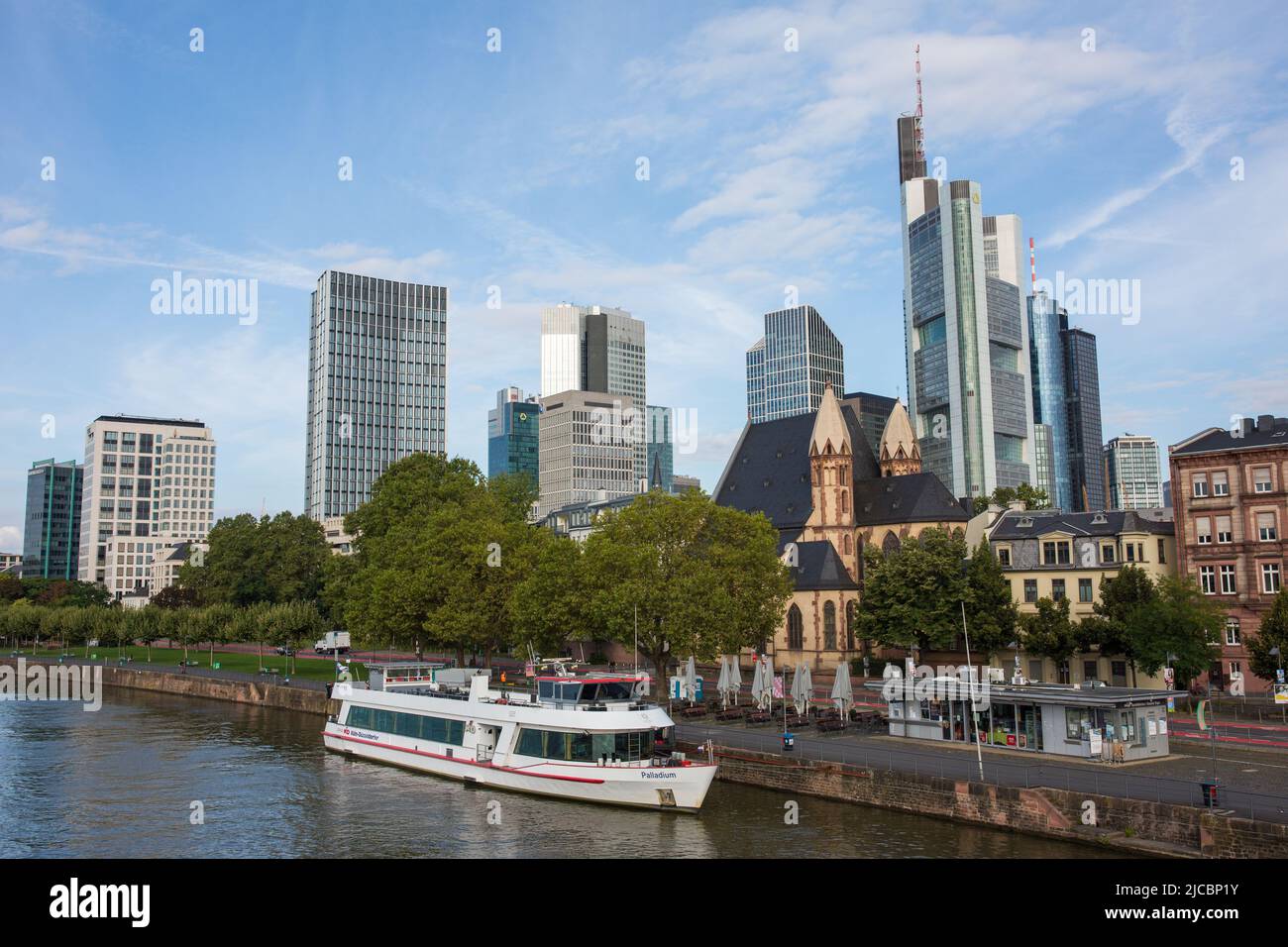 Frankfurt am Main, Germany - Aug 31, 2021: Frankfurt skyline with numerous skyscrapers. In the foreground Main river. Stock Photo