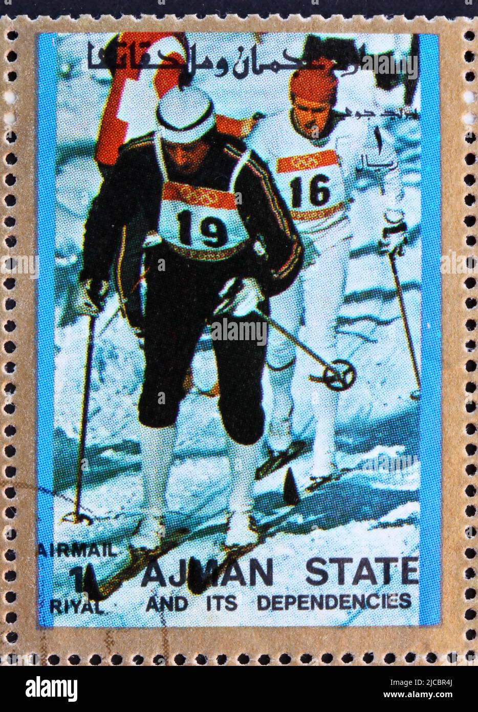 AJMAN - CIRCA 1973: a stamp printed in the Ajman shows Cross-country Skiing, Winter Olympics, circa 1973 Stock Photo