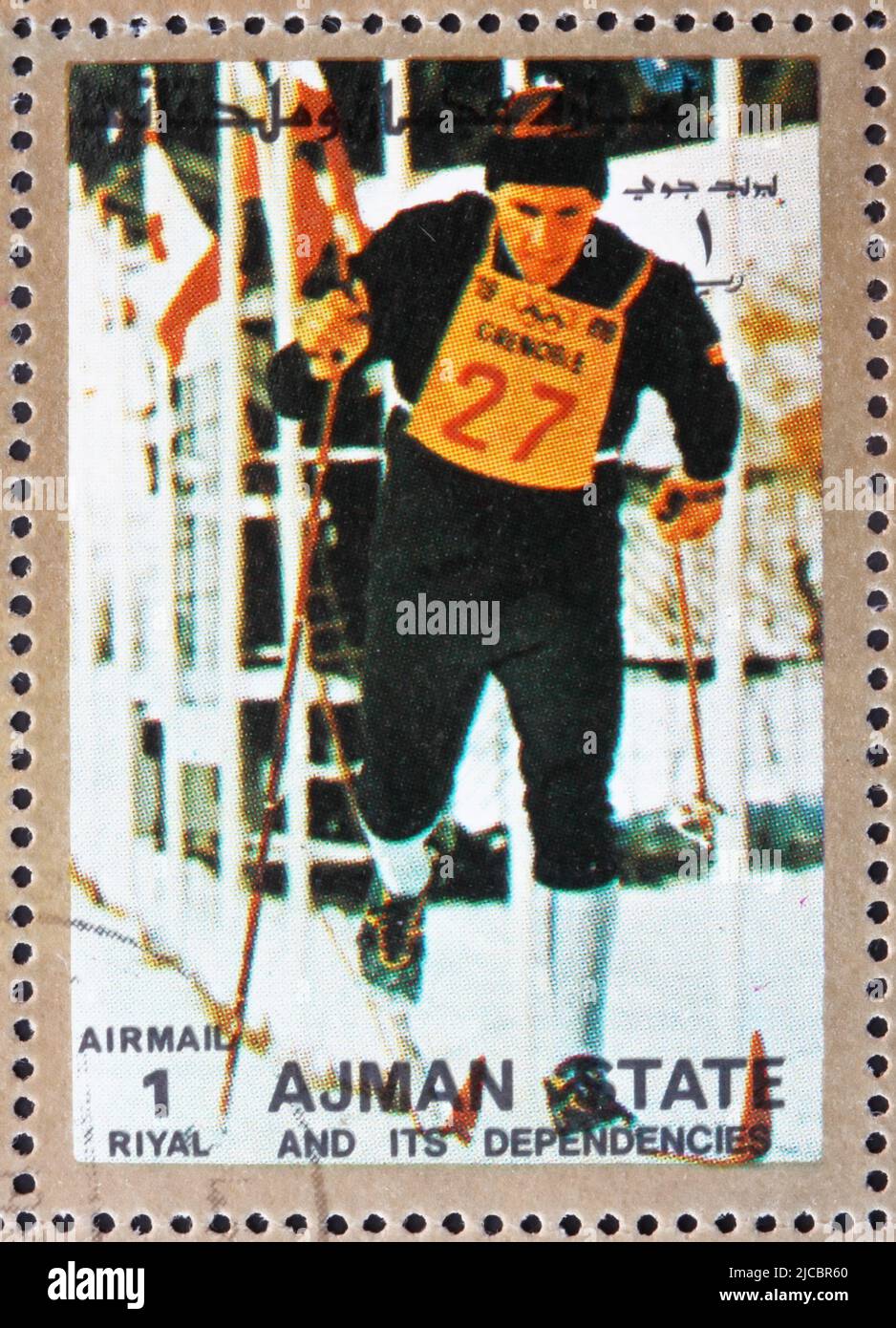 AJMAN - CIRCA 1973: a stamp printed in the Ajman shows Cross-country Skiing, Winter Olympics, circa 1973 Stock Photo