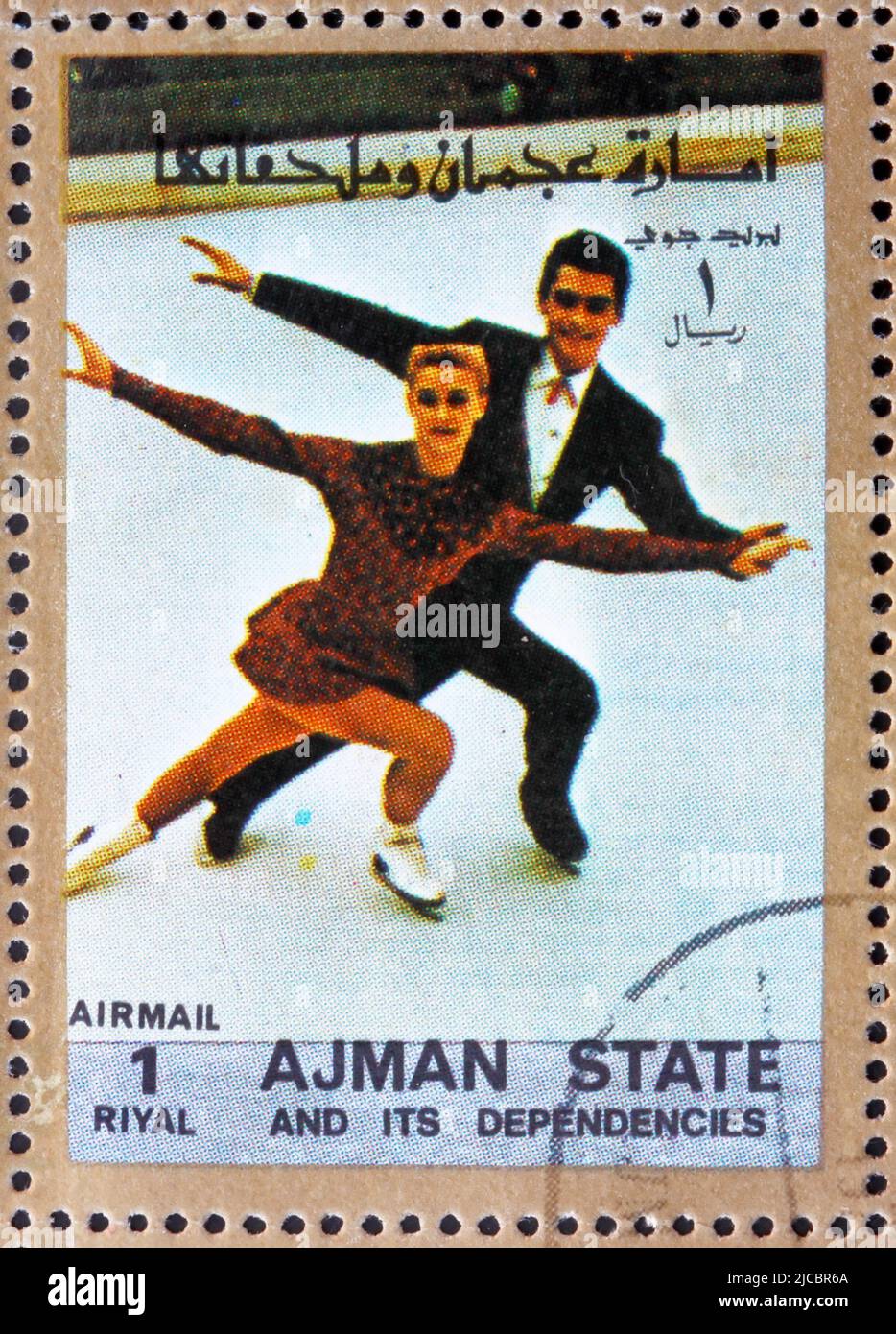 AJMAN - CIRCA 1973: a stamp printed in the Ajman shows Figure Skating, Ice Dancing, Winter Olympics, circa 1973 Stock Photo