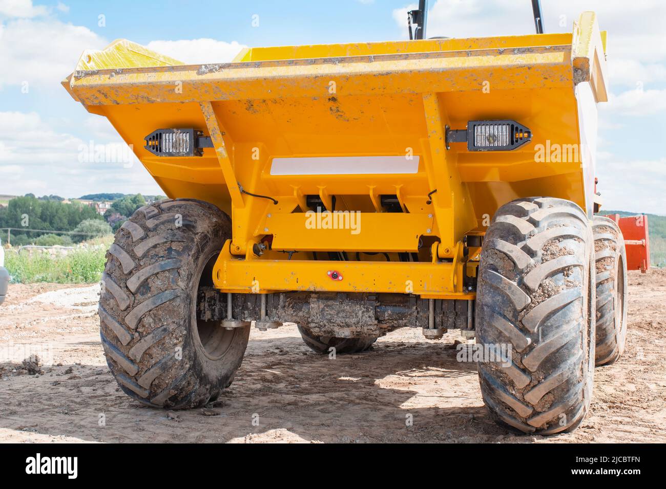 Close up of dumper truck tyres on construction site Stock Photo - Alamy