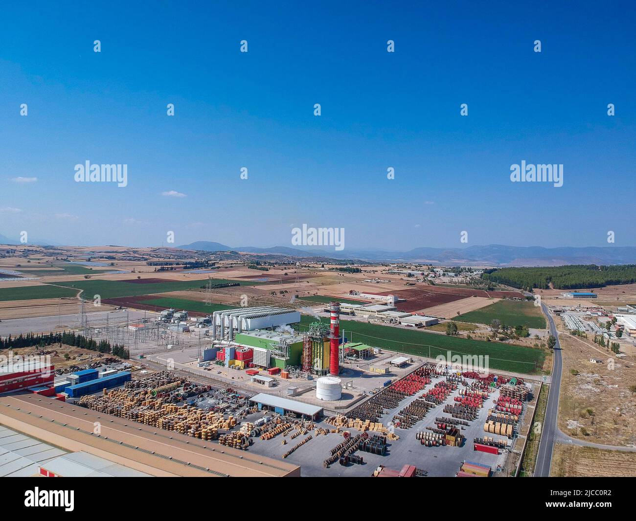 Artial view of CCGT Power Plant Thermoelectric plant near city of Thiva, in the region of Viotia, Greece. Thermal power station is a power station in Stock Photo