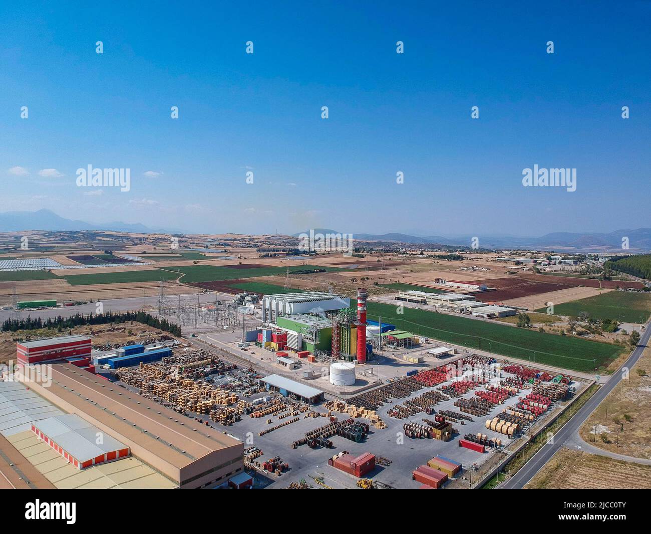 Artial view of CCGT Power Plant Thermoelectric plant near city of Thiva, in the region of Viotia, Greece. Thermal power station is a power station in Stock Photo