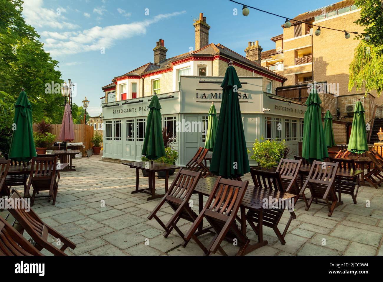 Spring morning at an Italian restaurant on the riverside in Cambridge, England. Stock Photo