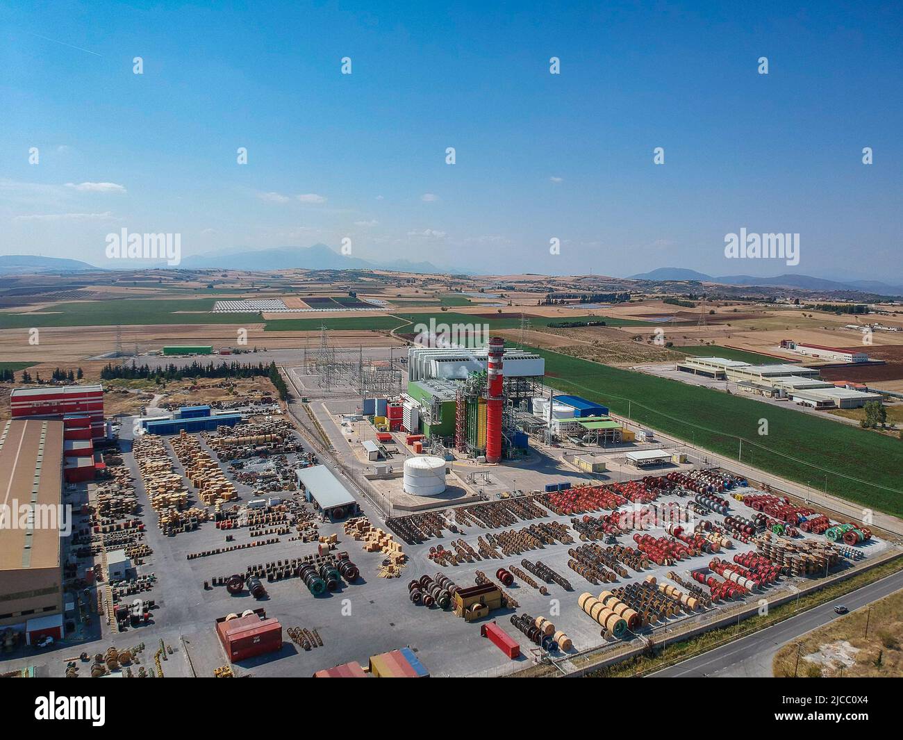 Artial view of CCGT Power Plant Thermoelectric plant near city of Thiva, in the region of Viotia, Greece. Thermal power station is a power station in Stock Photo