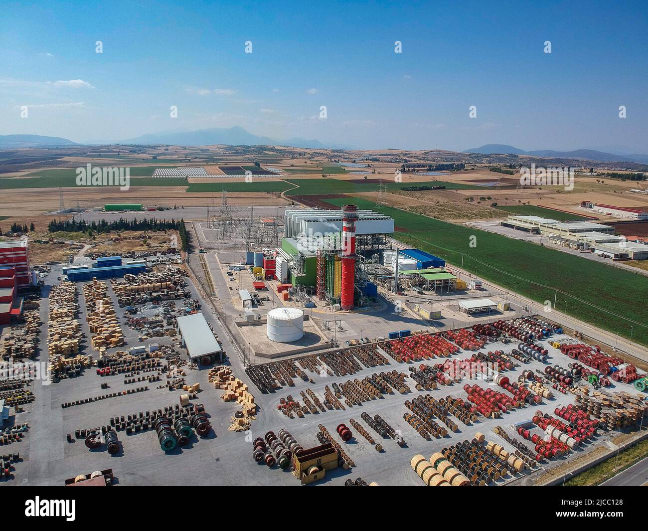 Artial view of CCGT Power Plant Thermoelectric plant near city of Thiva, in the region of Viotia, Greece. Thermal power station is a power station in Stock Photo