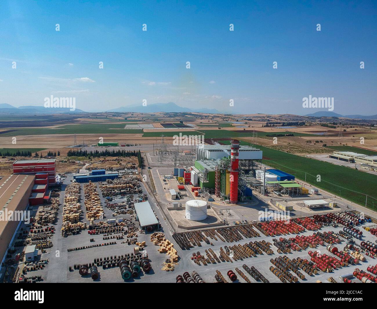 Artial view of CCGT Power Plant Thermoelectric plant near city of Thiva, in the region of Viotia, Greece. Thermal power station is a power station in Stock Photo