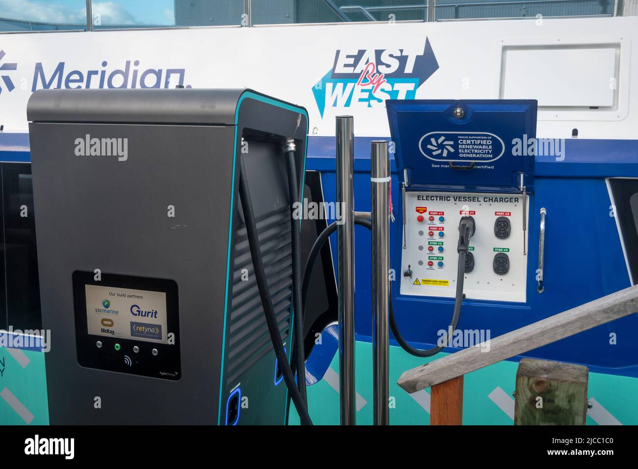 Electric powered ferry boat being charged at wharf, Wellington, North