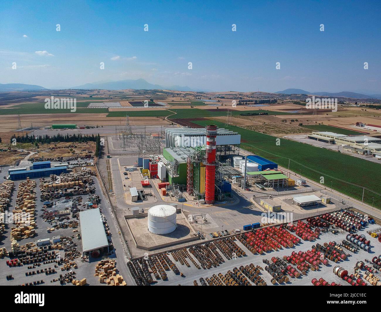 Artial view of CCGT Power Plant Thermoelectric plant near city of Thiva, in the region of Viotia, Greece. Thermal power station is a power station in Stock Photo