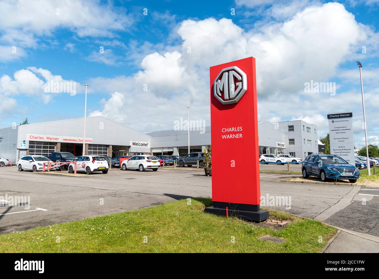 MG red advertising sign at entrance to Charles Warner motor dealership Outer Circle Road Lincoln 2022 Stock Photo